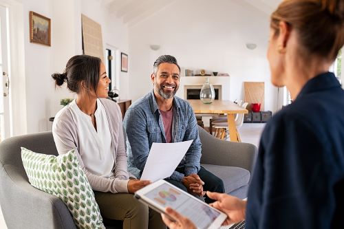 A couple meets with a financial advisor.